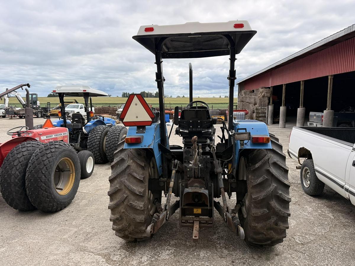 Used 1999 New Holland TL70, 65 hp 2WD Open Station Tractor
