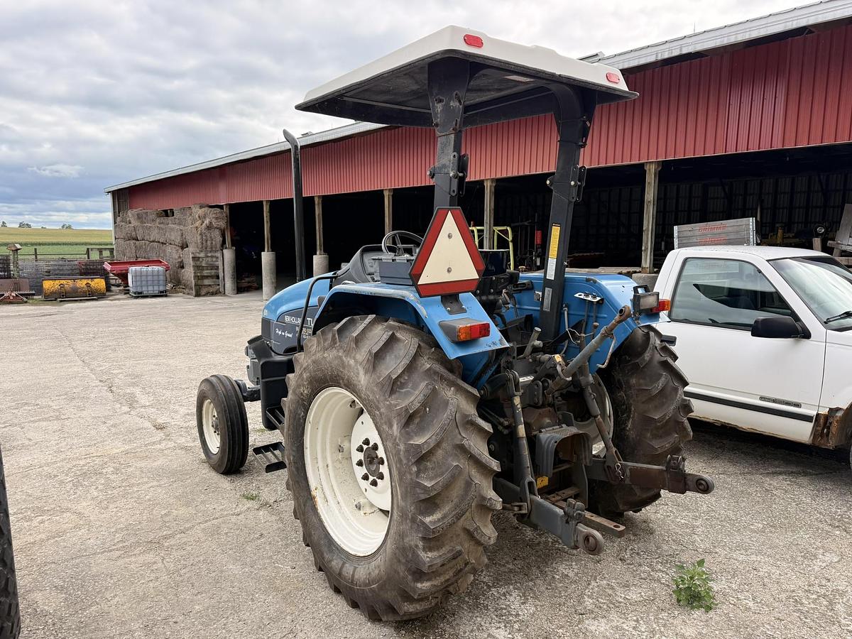 Used 1999 New Holland TL70, 65 hp 2WD Open Station Tractor