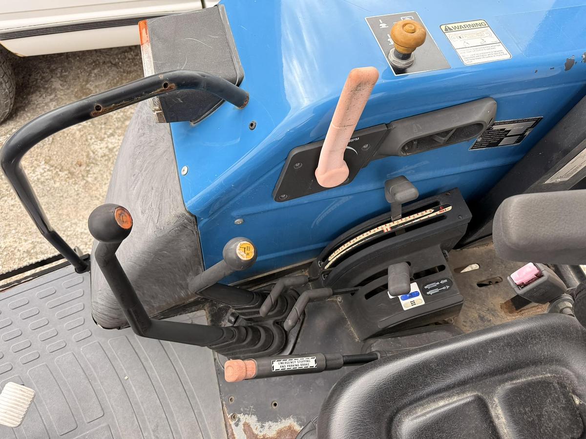 Used 1999 New Holland TL70, 65 hp 2WD Open Station Tractor