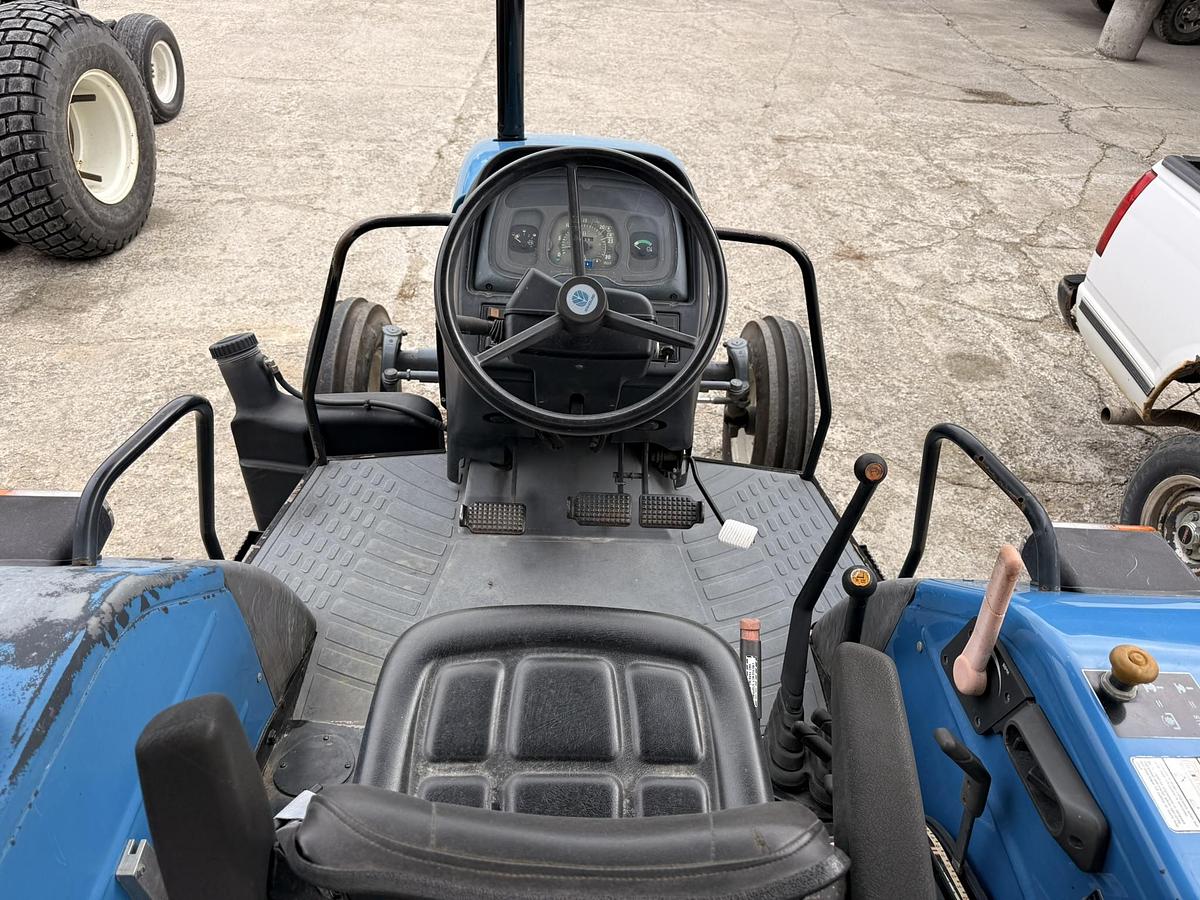 Used 1999 New Holland TL70, 65 hp 2WD Open Station Tractor