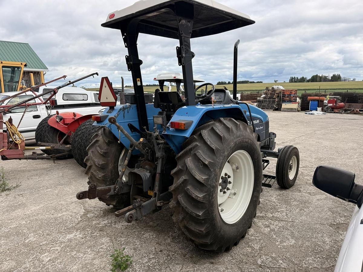 Used 1999 New Holland TL70, 65 hp 2WD Open Station Tractor