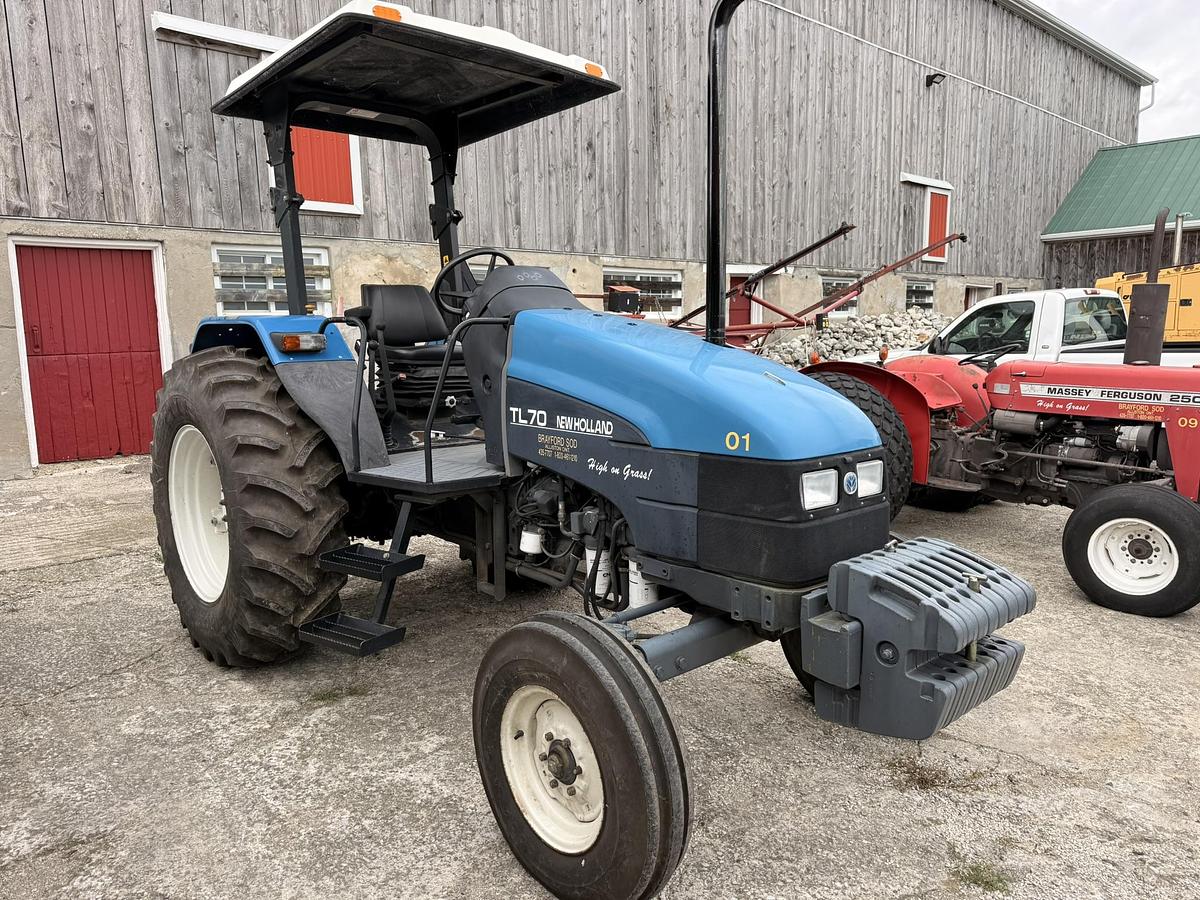 Used 1999 New Holland TL70, 65 hp 2WD Open Station Tractor