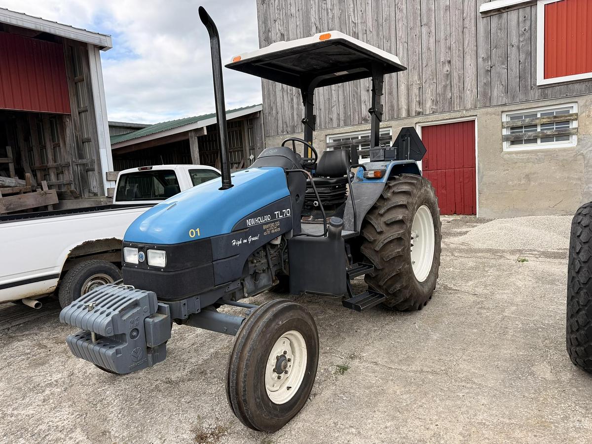 Used 1999 New Holland TL70, 65 hp 2WD Open Station Tractor