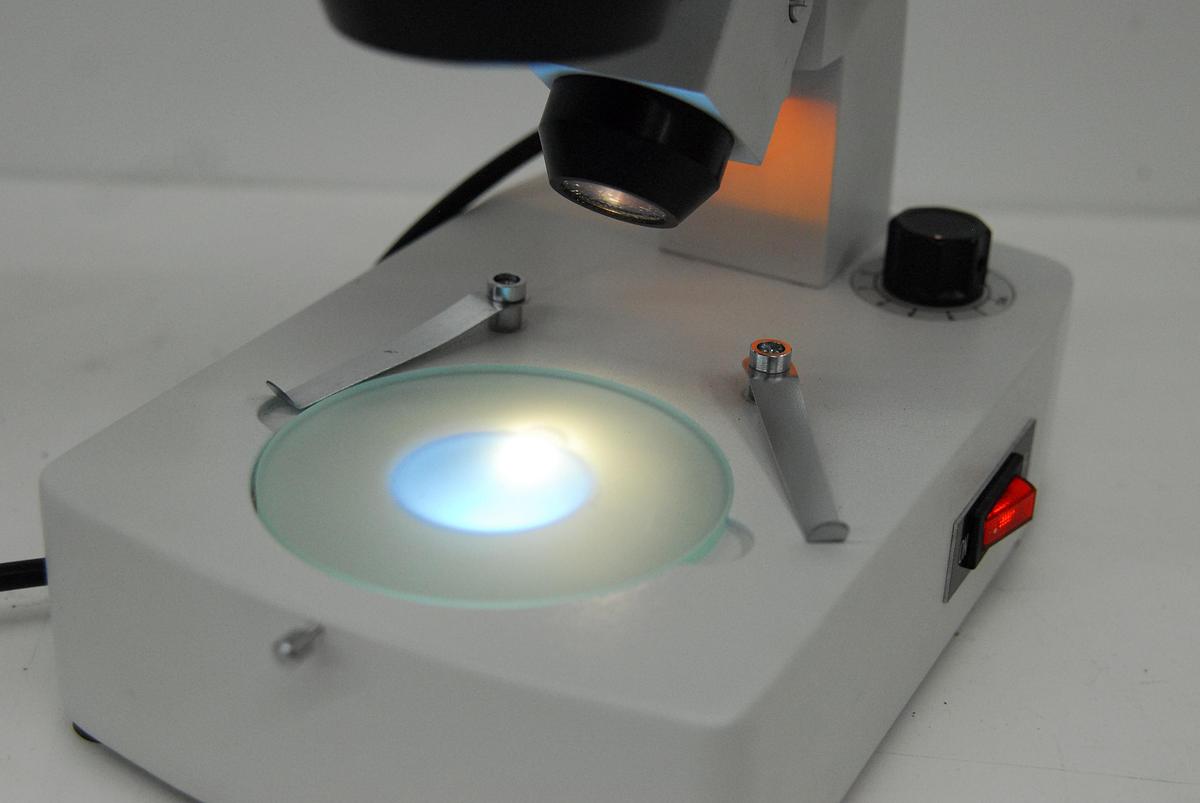 Used Stereo Microscope .7-4.5x (7-45x) Dual Illumination Base