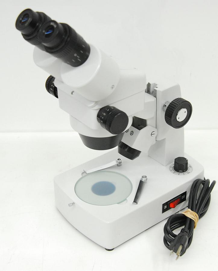 Used Stereo Microscope .7-4.5x (7-45x) Dual Illumination Base