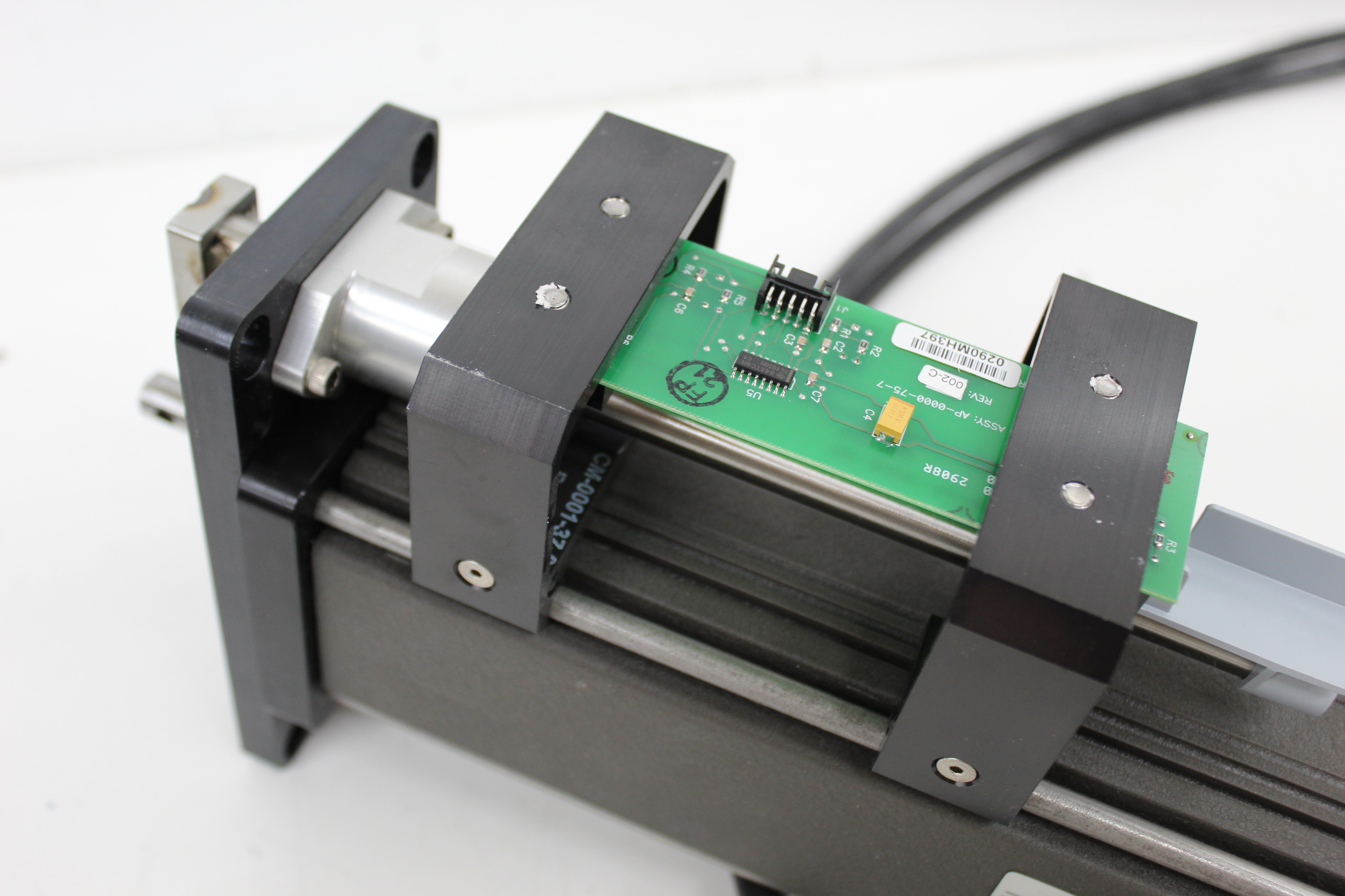 Used Exlar SR31-0602-XFX-EM2-238-45-AR-XT Linear Actuator w/ Emerson EI-205 Drive