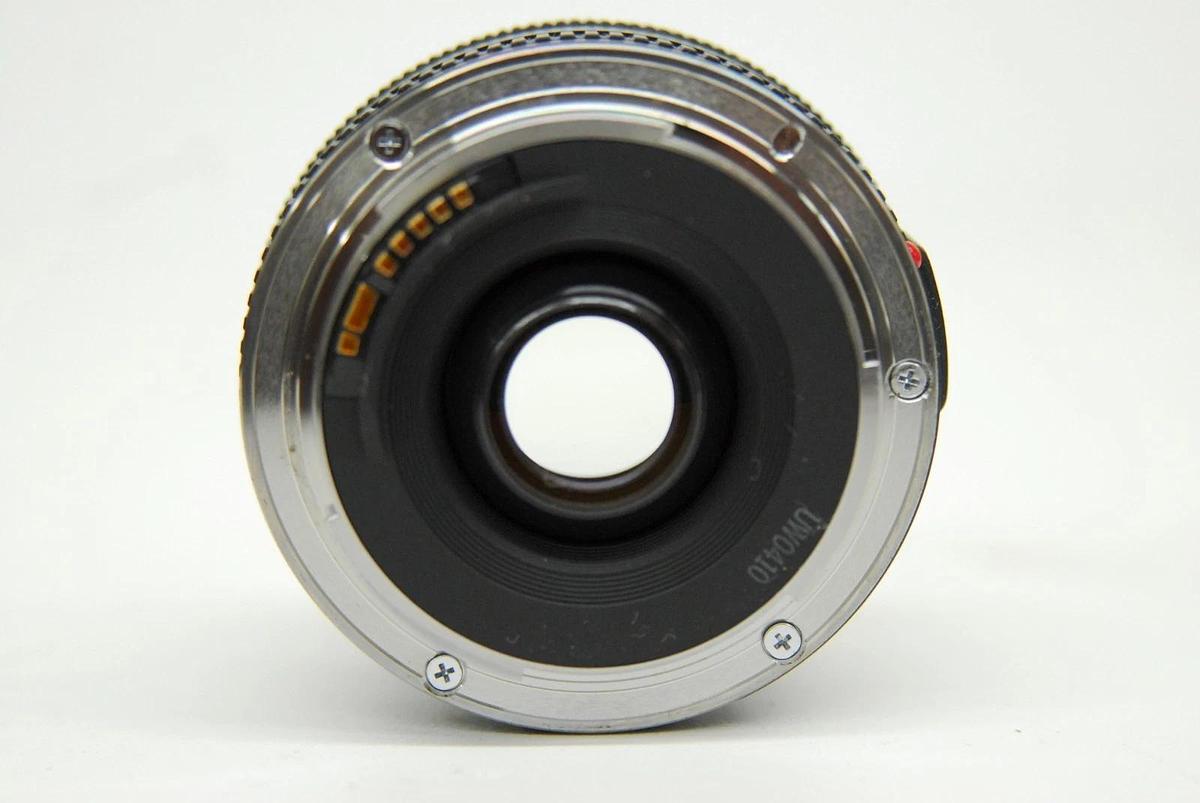 Used Canon EF 28mm 1:2.8 EOS Lens W/ HOYA 52mm UV Filter