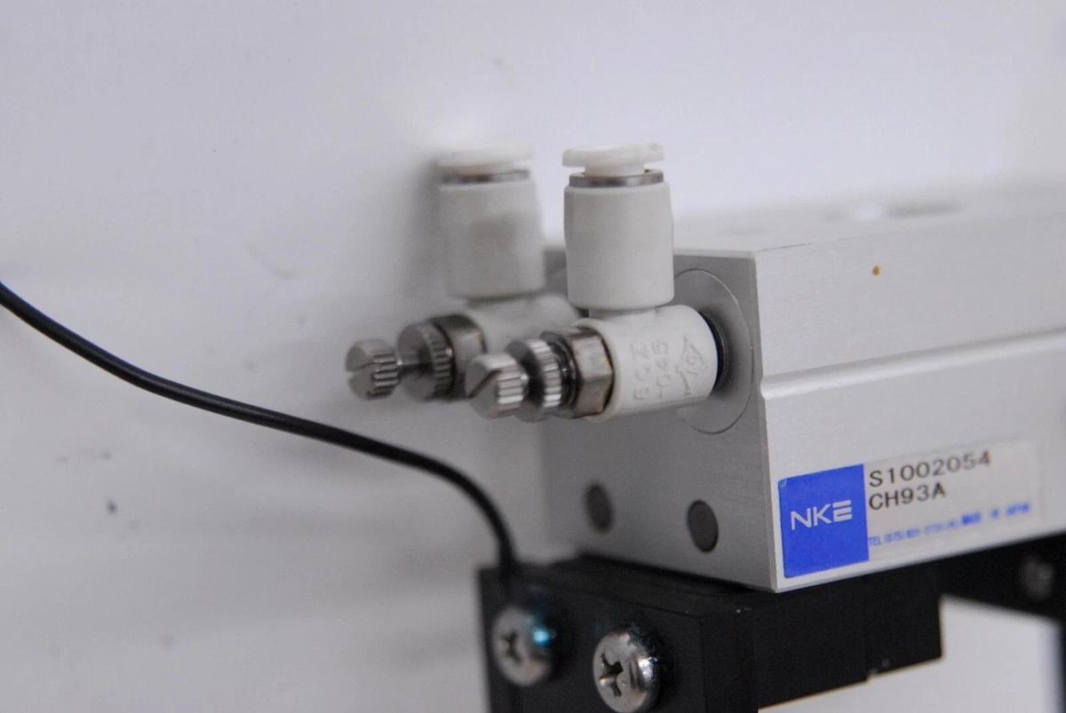 Used NKE CH93A Finger Cylinder W/ Attached Grabbers