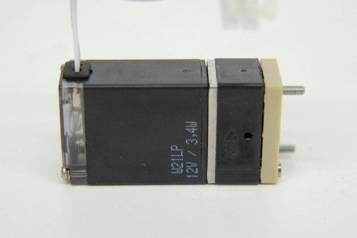 Used Burkert 6606-A Direct-Acting Rocker Solenoid Valve (12 VDC, 3.4 W, 87 PSIG)