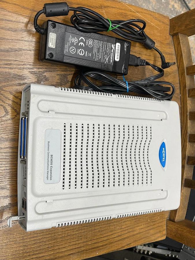 Used Nortel BCM50 Expansion NT9T6402E5 G4X16 W/ A/C Adapter