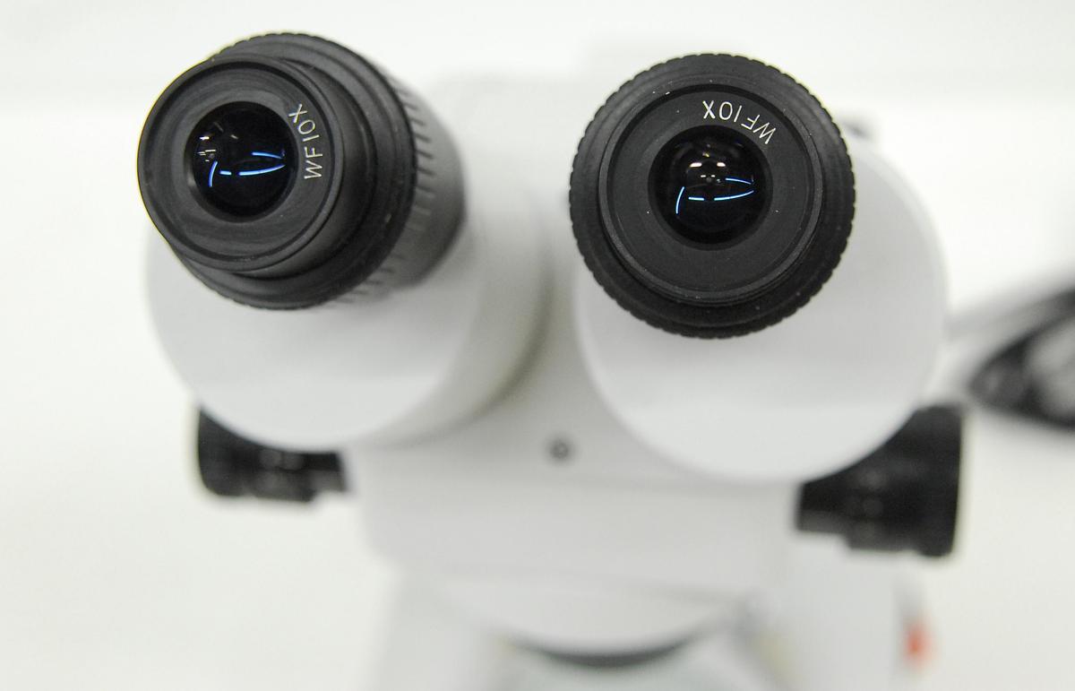 Used Stereo Microscope .7-4.5x (7-45x) Dual Illumination Base