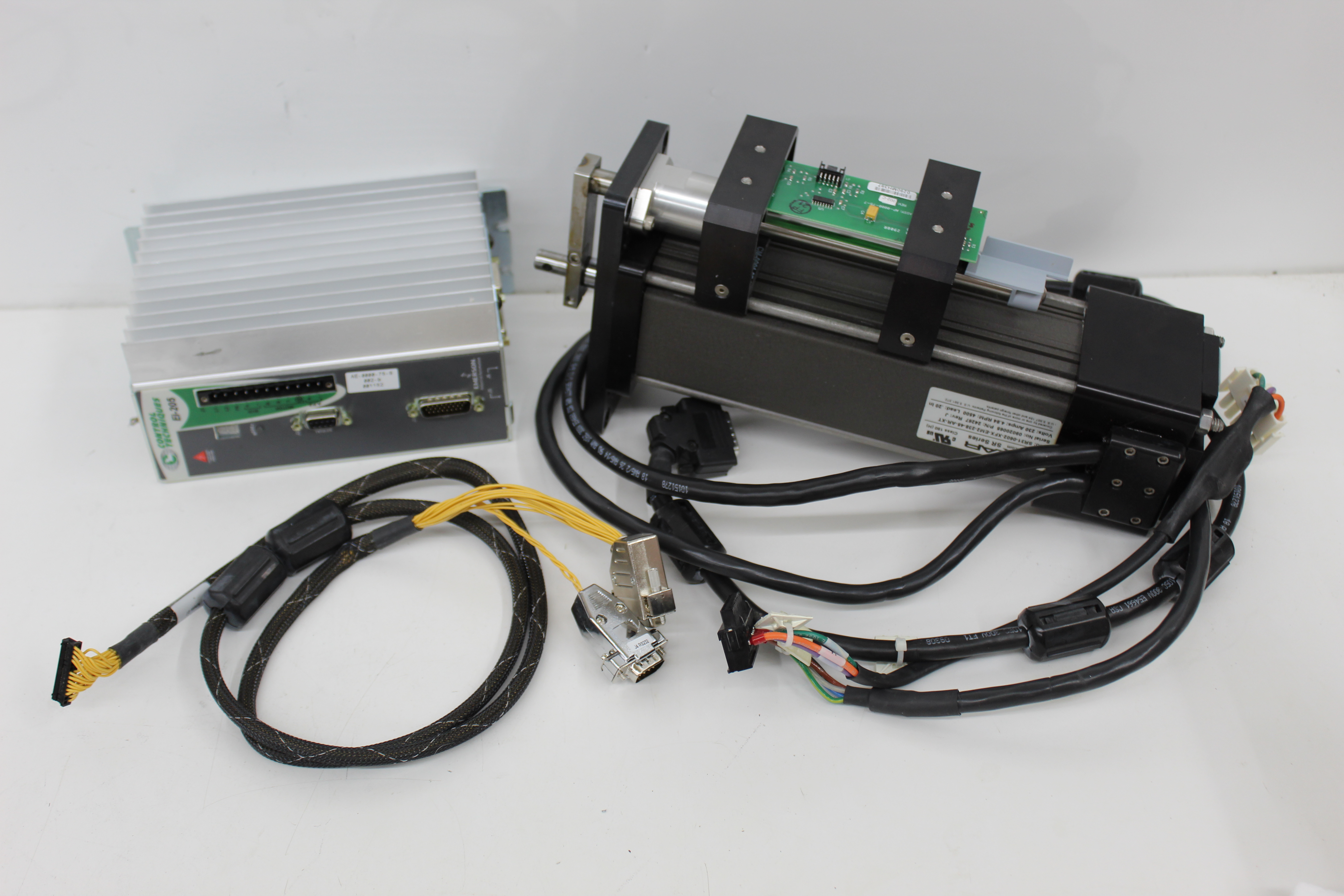 Used Exlar SR31-0602-XFX-EM2-238-45-AR-XT Linear Actuator w/ Emerson EI-205 Drive