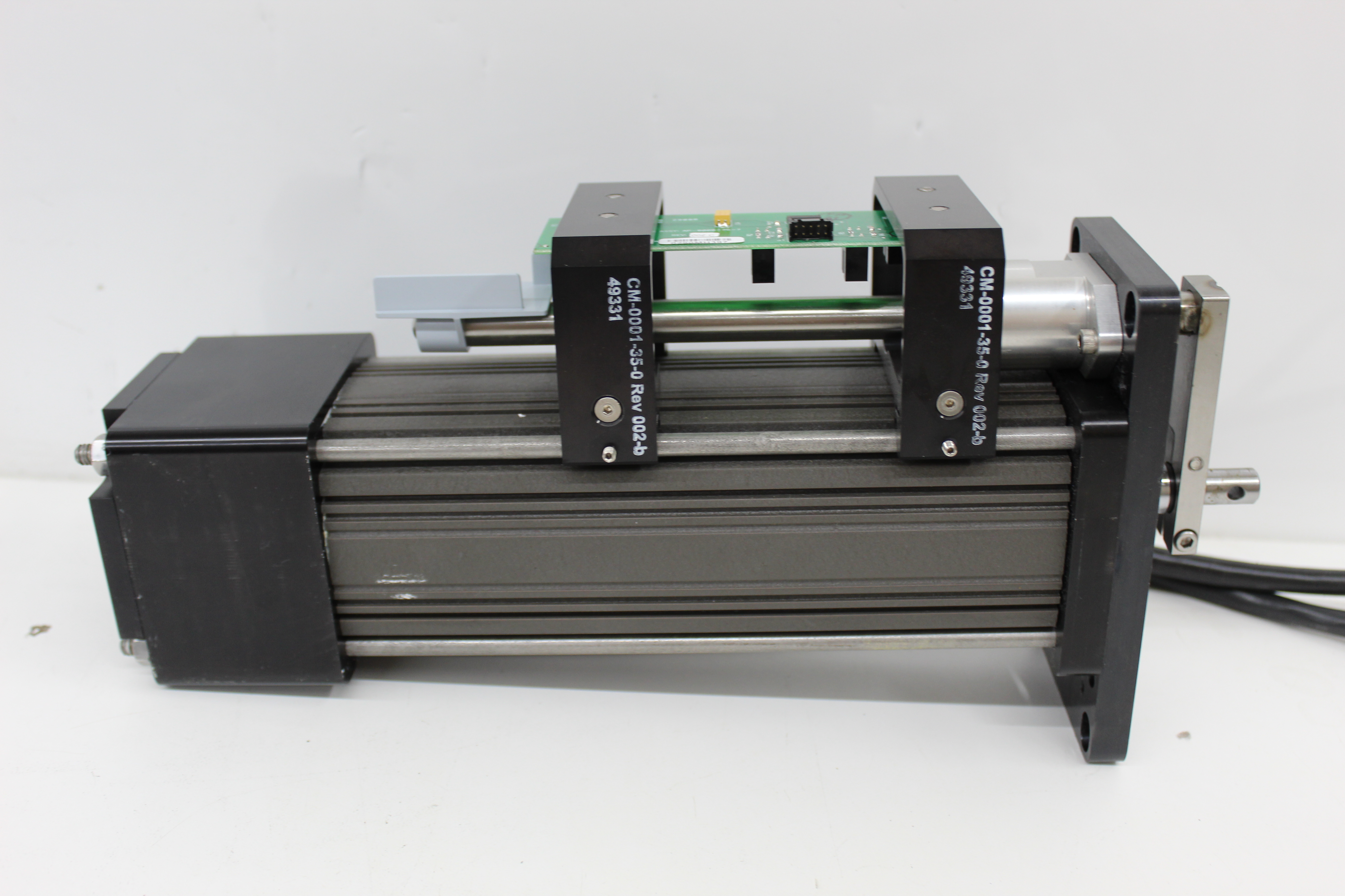 Used Exlar SR31-0602-XFX-EM2-238-45-AR-XT Linear Actuator w/ Emerson EI-205 Drive