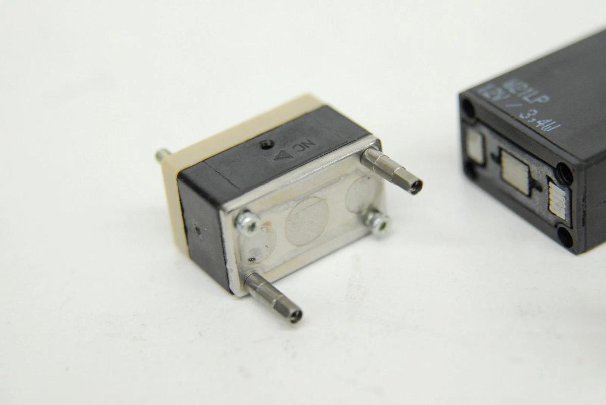 Used Burkert 6606-A Direct-Acting Rocker Solenoid Valve (12 VDC, 3.4 W, 87 PSIG)