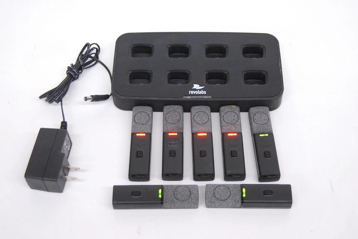 Used Revolabs 02-08HDCHG-C Charging Base W/ 7x 01-HDTBLMIC-OM-11 Microphones