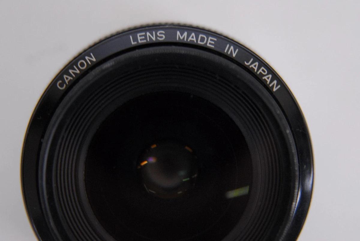 Used Canon EF 28mm 1:2.8 EOS Lens W/ HOYA 52mm UV Filter