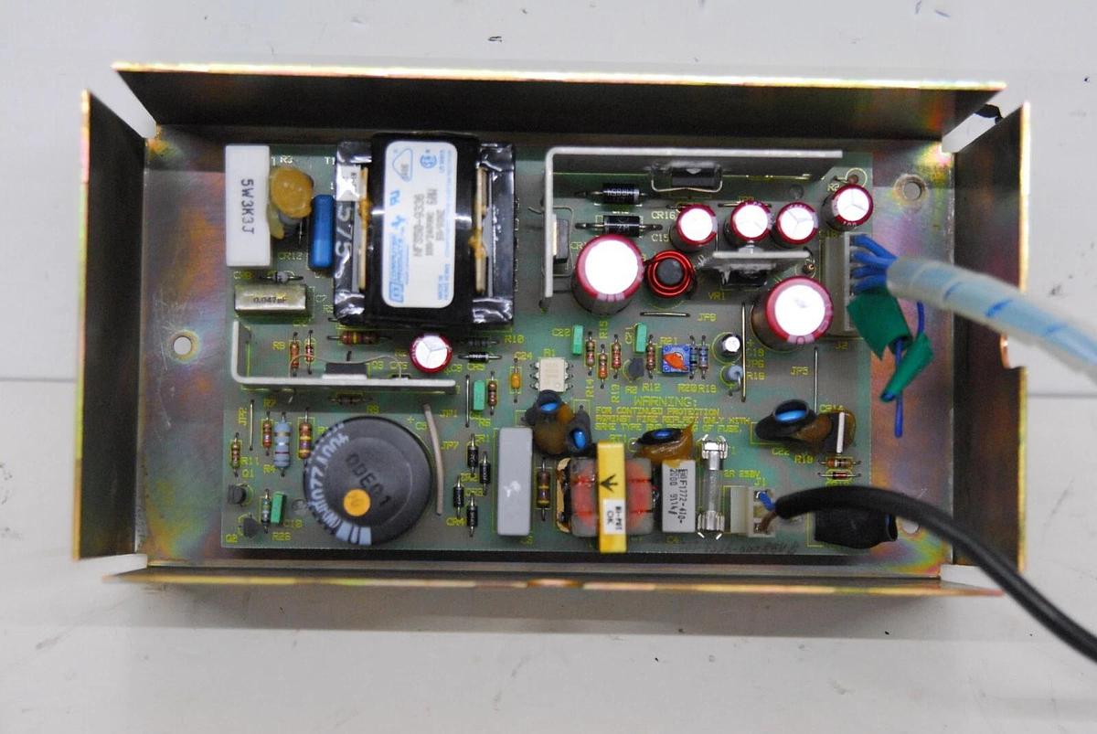 Used DEA G56230700 Power Supply W/ Mounting Bracket, Attached Cables