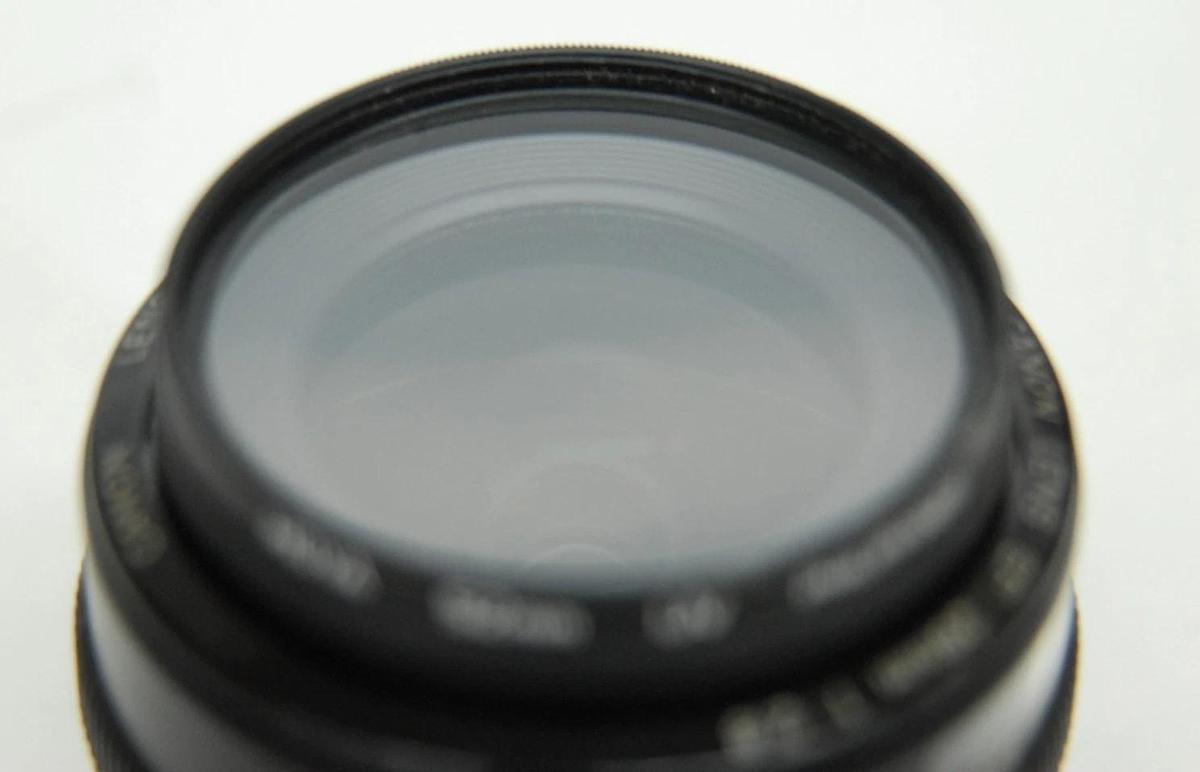 Used Canon EF 28mm 1:2.8 EOS Lens W/ HOYA 52mm UV Filter
