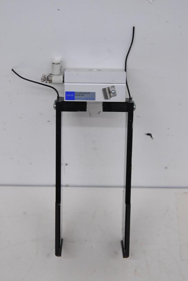 Used NKE CH93A Finger Cylinder W/ Attached Grabbers