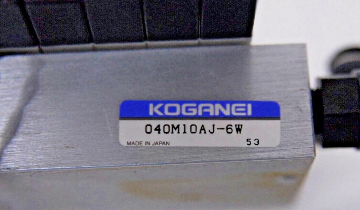 Used Koganei 040M10AJ-6W Manifold W/ 8 A040-4E1 Air Valves