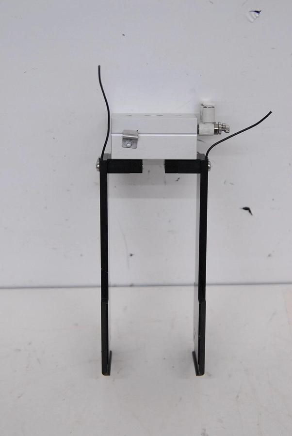 Used NKE CH93A Finger Cylinder W/ Attached Grabbers