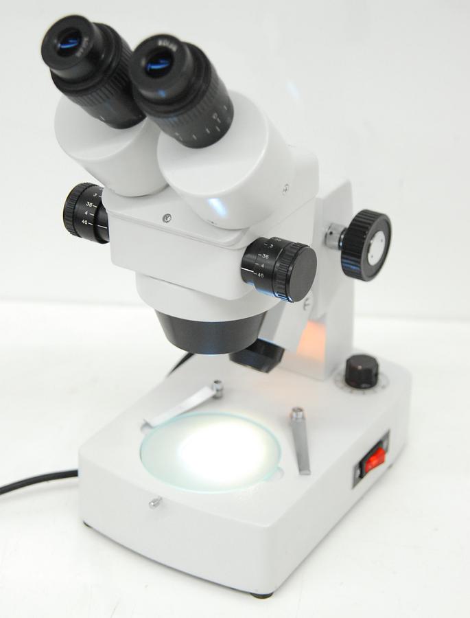 Used Stereo Microscope .7-4.5x (7-45x) Dual Illumination Base