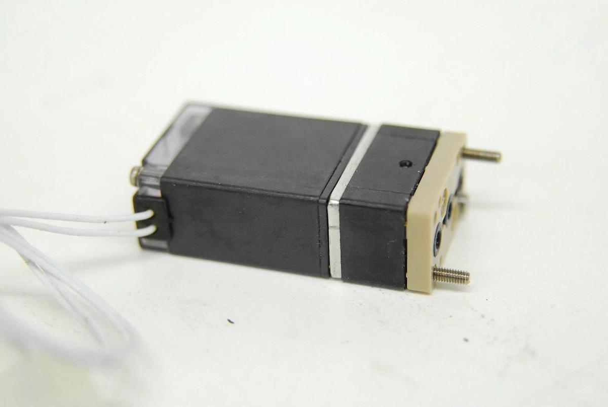 Used Burkert 6606 Direct-Acting Rocker Solenoid Valve (12 VDC, 3.4 W, 87 PSIG)