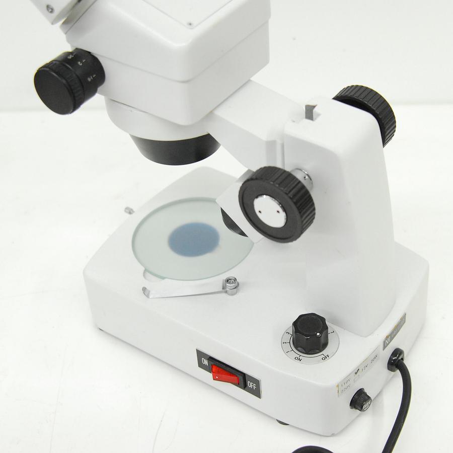 Used Stereo Microscope .7-4.5x (7-45x) Dual Illumination Base
