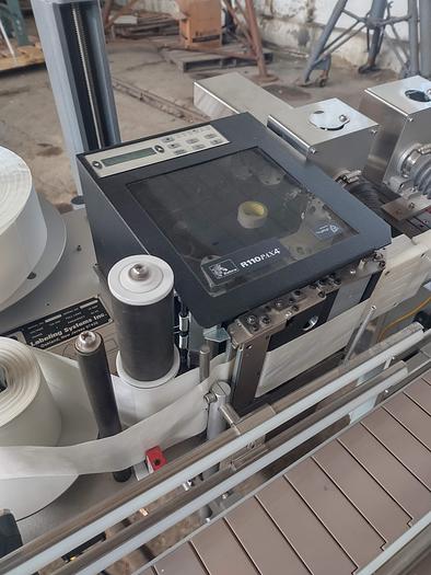 Used LSI Model 20-64  with Zebra Print bar code labeler