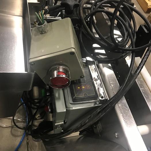 Used NJM Autocolt III - High Speed Pressure Sensitive Wraparound Labeler