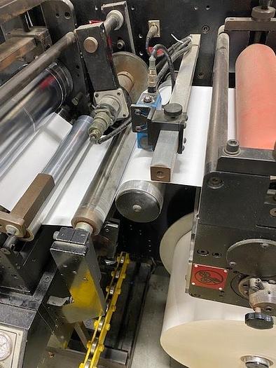Used 13" WIDE ROTOFLEX DLI REWINDER WITH 2 STATION DIE CUTTING - RECENT DRIVE UPDATE