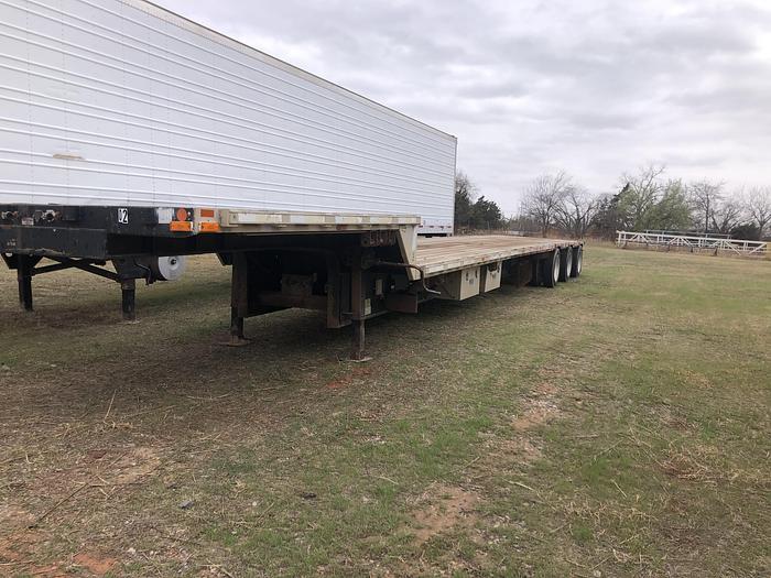 Used 2004 Transcraft 53 ft step deck trailer