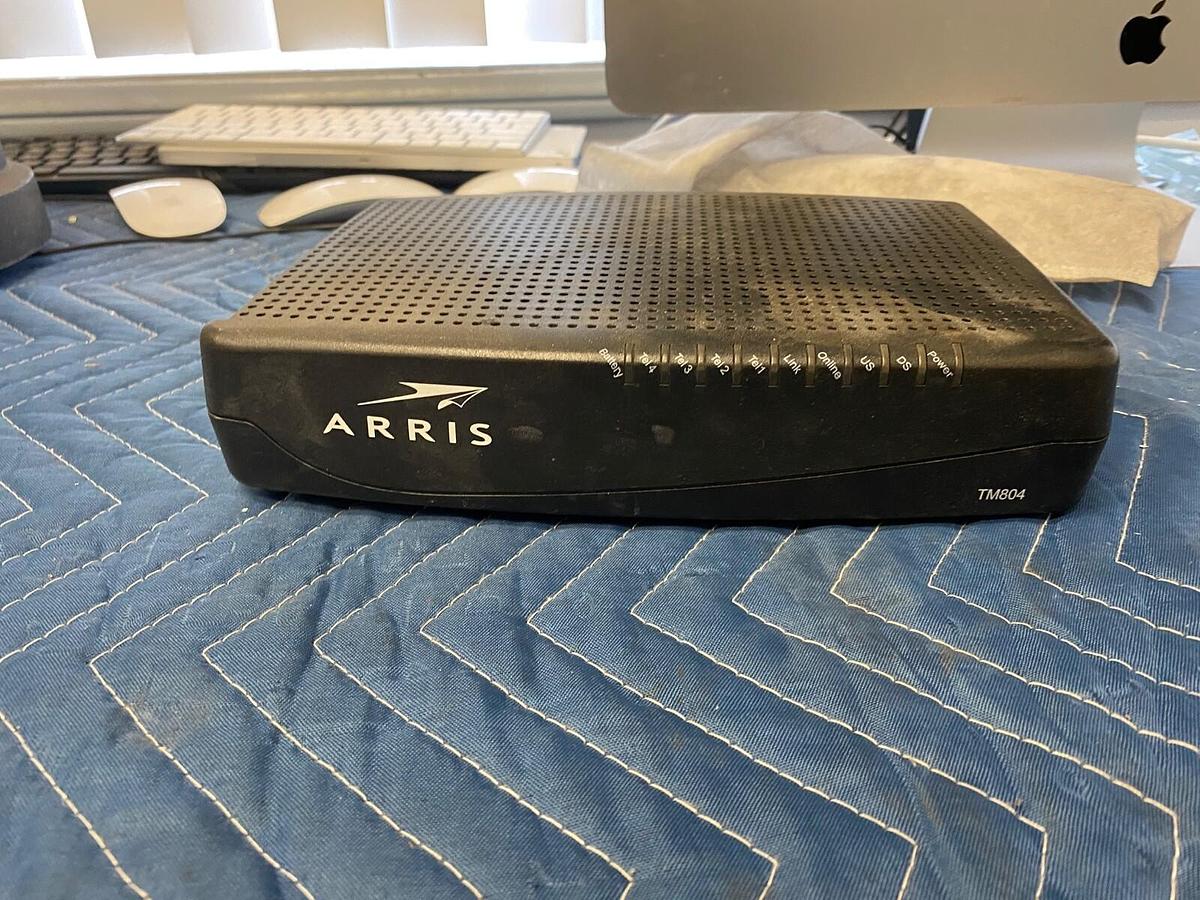 Used ARRIS Touchstone TM804 Telephony Modem 9 (no battery)