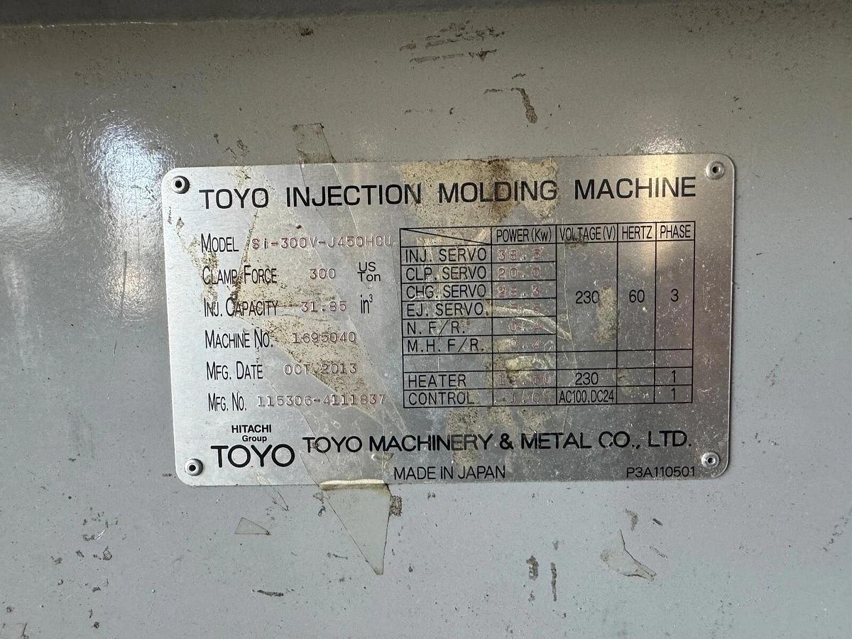 Used 2013 Toyo Si300v J450HCU  17.5 oz shot.