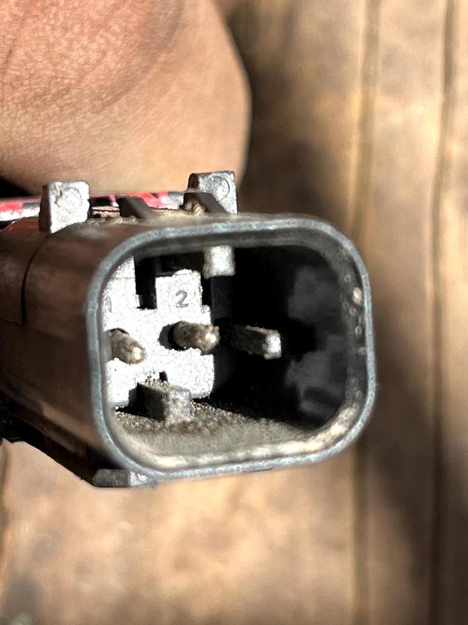 Used CAT Part # 506-5802.  BACK FLOW / RETURN WHITE PUMP CONNECTOR.  NEW.