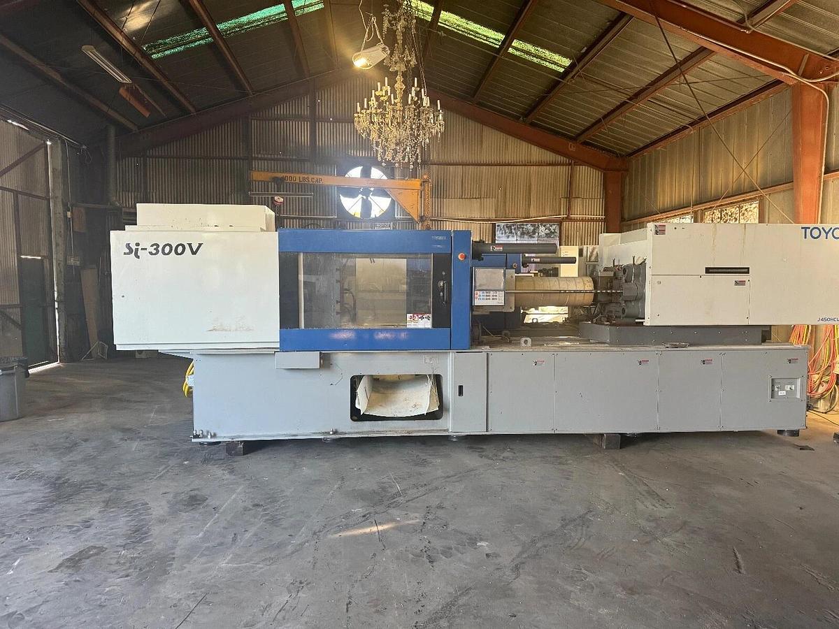 Used 2014 Toyo Si300v J450HCU  17.5 oz shot.