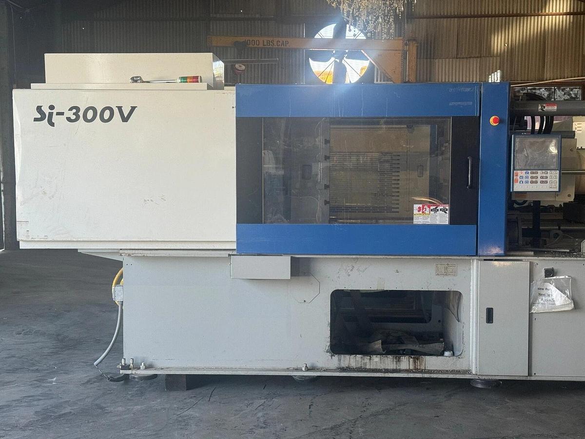 Used 2013 Toyo Si300v J450HCU  17.5 oz shot.