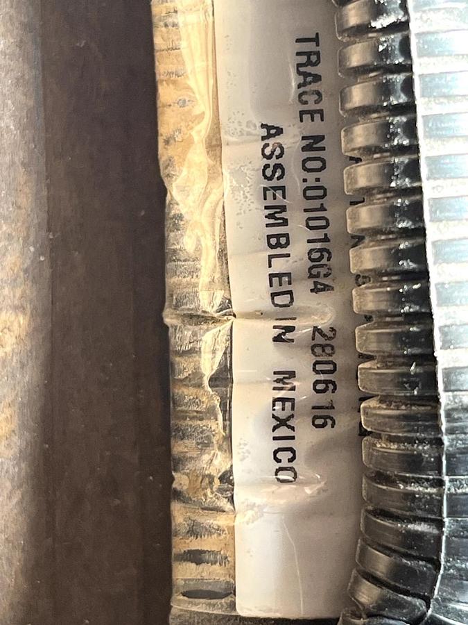 Used CAT Part # 506-5802.  BACK FLOW / RETURN WHITE PUMP CONNECTOR.  NEW.