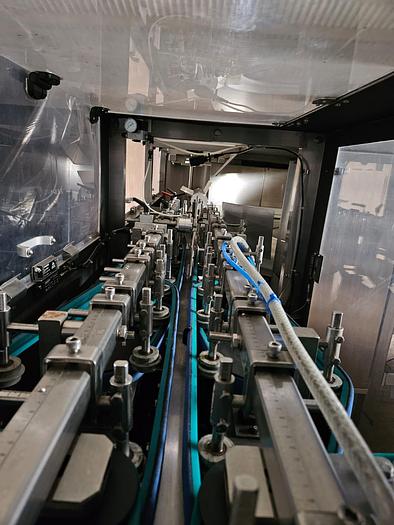 Used BOTTLE UNSCRAMBLER WITH HOPPER ELEVATOR