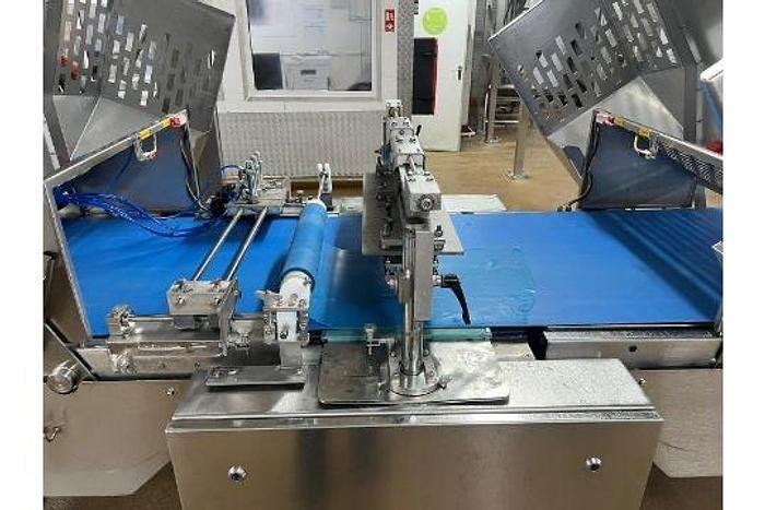 Used TROMP LINE 1x Tromp line comprising of main line pastry cutting marking discs, burgess calibrator with 2 flour dusters, rondo marker, cutter unit, hand crimped cutter and sensor, tromp depositor with stairs, rondo guillotine and cutters and dockers, portable scrap pastry unit, wire belt take off conveyor, 3 chain take off conveyor, hugging conveyor, topping machine with stand, 6 lane forming box, product divider, 2 off drum pastry cutters (foils) 1 off marker unit (chevron) Main panel Tromp (office), Main Panel Rondo, HMI Panel Tromp, HMI panel rondo, 3 off single step stands.. Located Wiltshire. UKFM4-6314 Lift out £2500