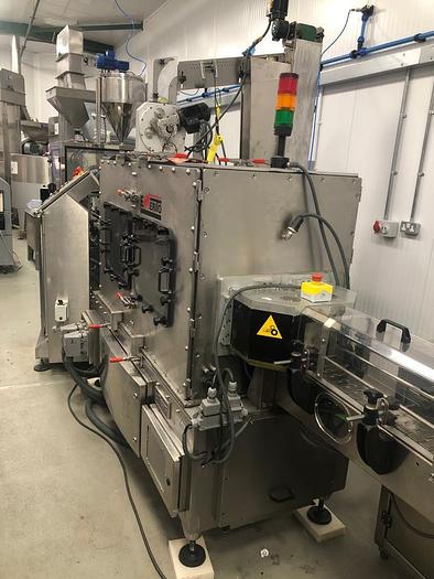 Used JAR/POT FILLER WITH CAPPING MACHINE