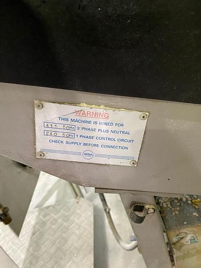 Used Loma Systems metal detector on inclined frame