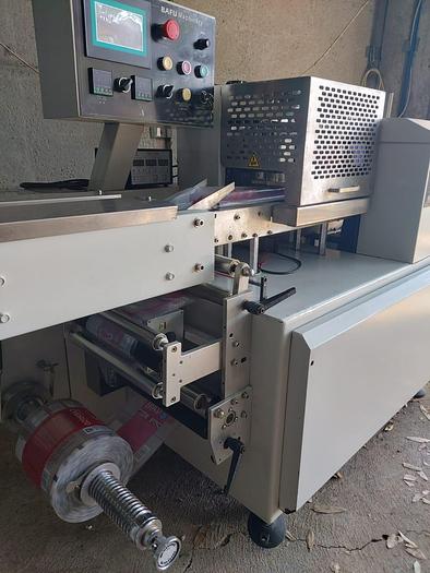 Used INVERTED HORIZONTAL FLOWRAPPER
