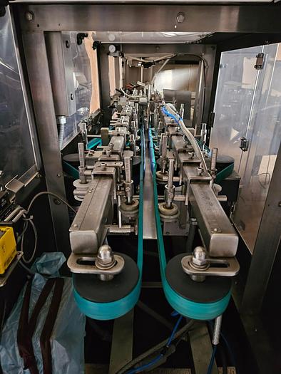 Used BOTTLE UNSCRAMBLER WITH HOPPER ELEVATOR