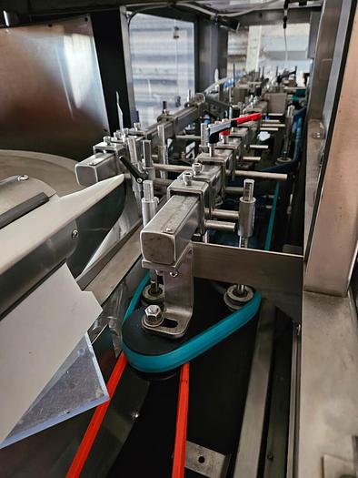 Used BOTTLE UNSCRAMBLER WITH HOPPER ELEVATOR