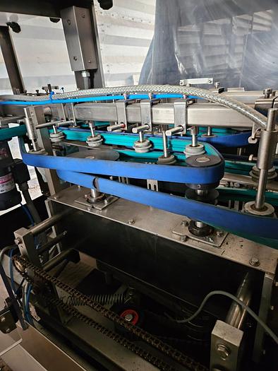 Used BOTTLE UNSCRAMBLER WITH HOPPER ELEVATOR