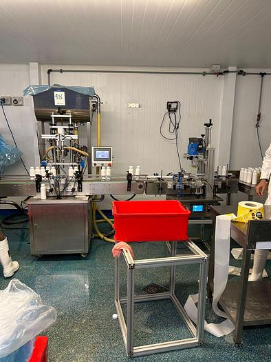 Used BOTTLING AND FILLIUNG LINE