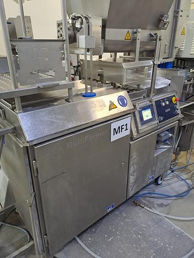 Used GEA MULTIFORMER, STICK INSERTER AND COLUMN LOADER