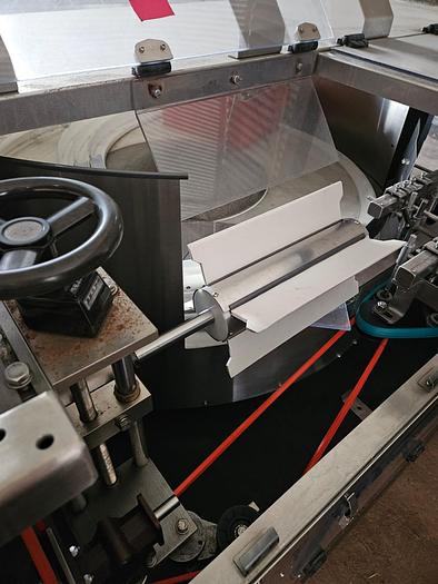 Used BOTTLE UNSCRAMBLER WITH HOPPER ELEVATOR