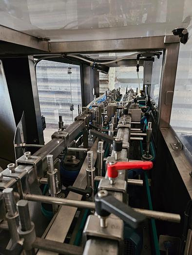 Used BOTTLE UNSCRAMBLER WITH HOPPER ELEVATOR